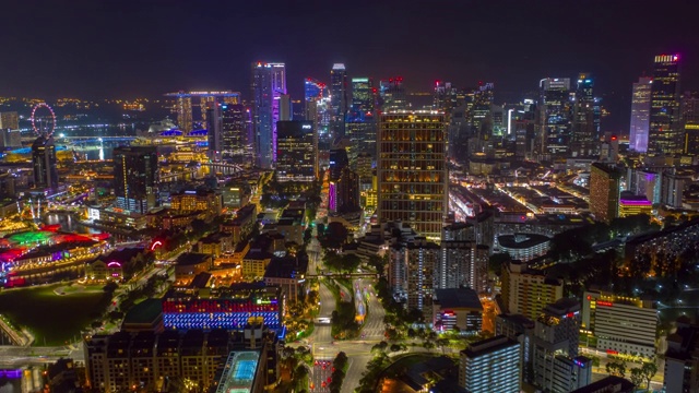 夜间照明新加坡城市中心交通街道空中延时全景4k视频素材