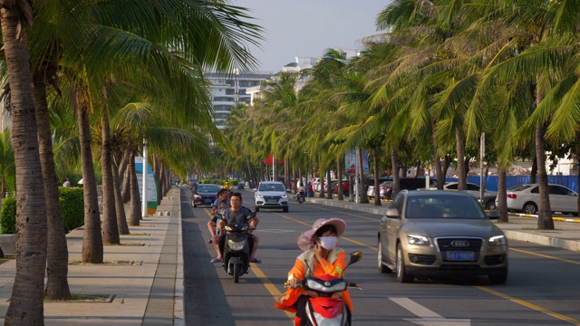 日落时间三亚城市交通街道全景4k海南中国视频素材