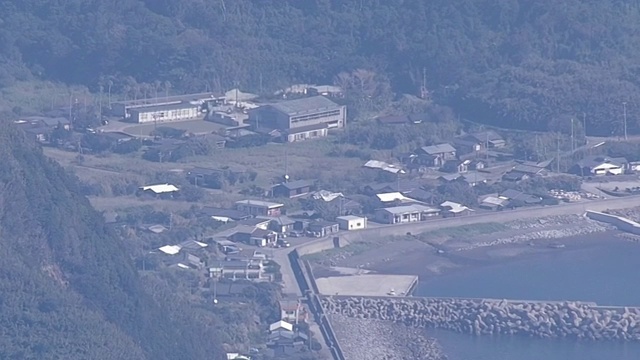 日本鹿儿岛，空中，村庄和新田山视频素材