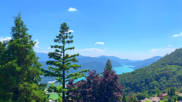 卢加诺市的全景和风景与高山和高山湖视频素材