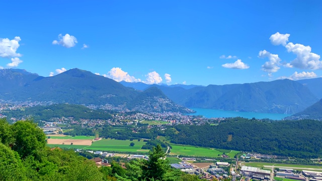 卢加诺市的全景和风景与高山和高山湖视频素材