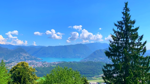 卢加诺市的全景和风景与高山和高山湖视频素材