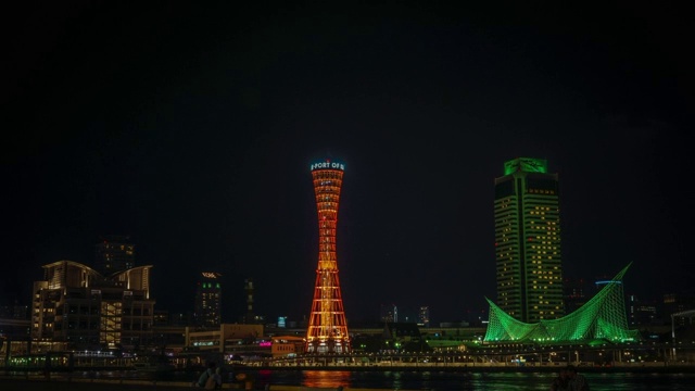 神户塔和海港周围的土地在夜晚的时间流逝视频素材