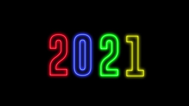 霓虹彩色文字“2021年新年快乐”。新年亮闪闪的标志。视频素材