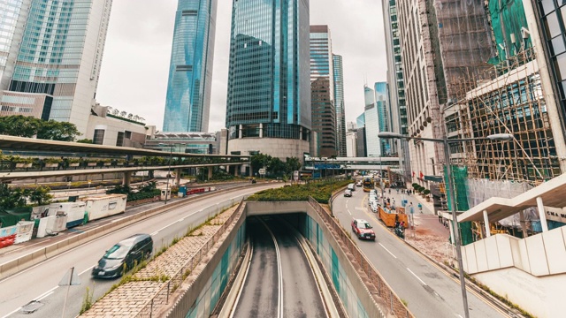 时间流逝的香港中区，交通和现代化的建筑视频素材