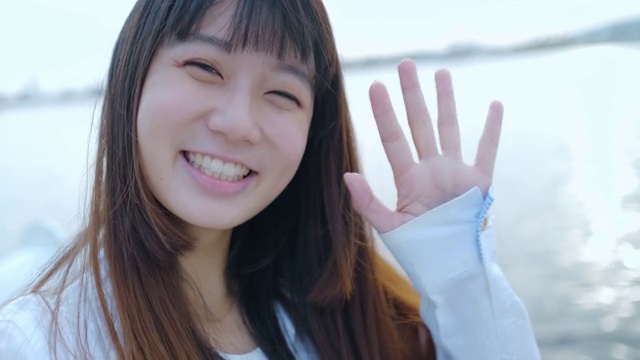 亚洲女人微笑自拍视频素材