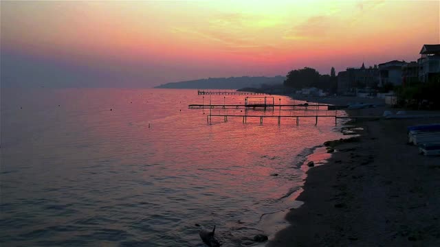 夕阳西下，海面无人平静，紫鸟海岸视频素材