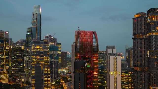 黄昏夜晚照明新加坡城市市中心屋顶延时全景4k视频素材