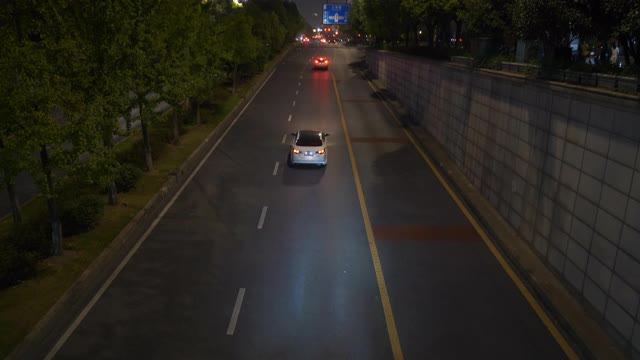 夜景时间照亮了杭州市区交通街道隧道全景4k中国视频素材