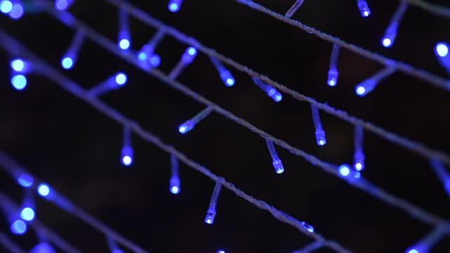 蓝色的霓虹灯装饰在圣诞节和新年。视频下载