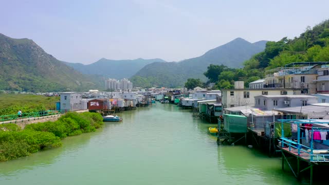 大屿山大澳渔村上空低空飞行视频素材