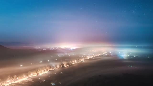 时间流逝美丽的夜晚到白天的城市景观在自然背景视频素材