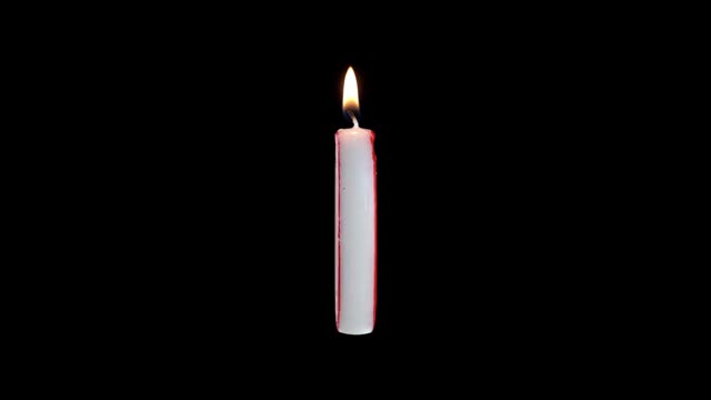 数字为零的蜡烛在白色背景上旋转视频素材