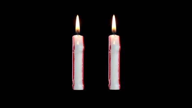带有数字11的蜡烛在白色背景上旋转视频素材