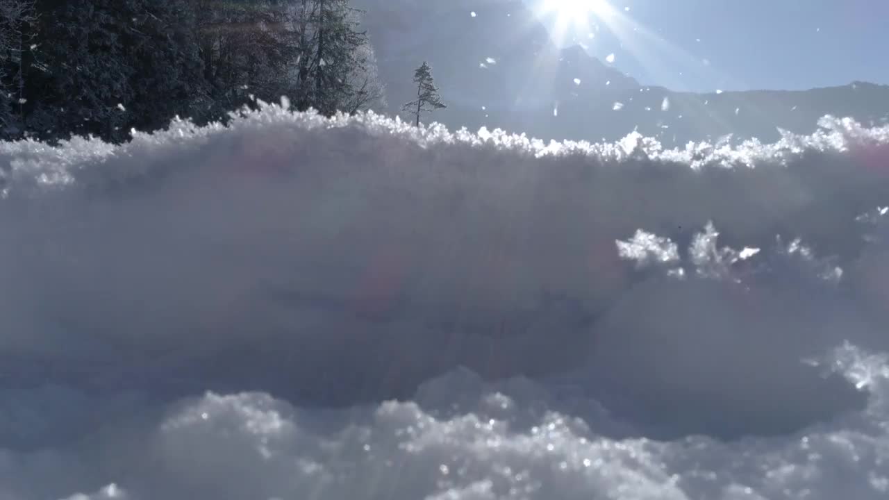 在德国巴伐利亚州冰雪覆盖的湖面上飞行视频素材