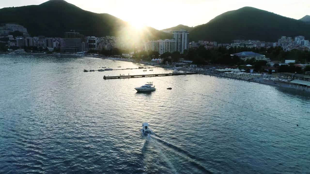 Budva Marina Pier With Yachts, Boats, City Beach And Mountains股票视频股票视频视频素材