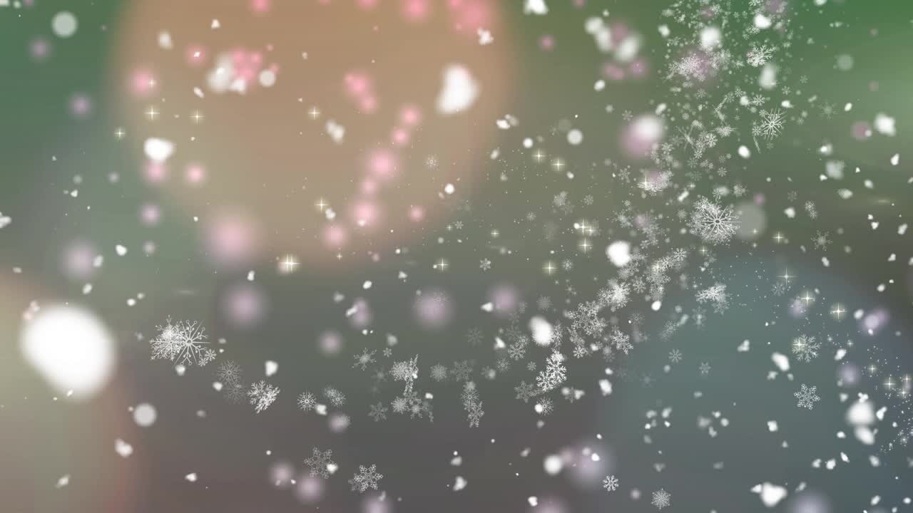 数字动画的雪花飘落在绿色背景上的光点视频素材