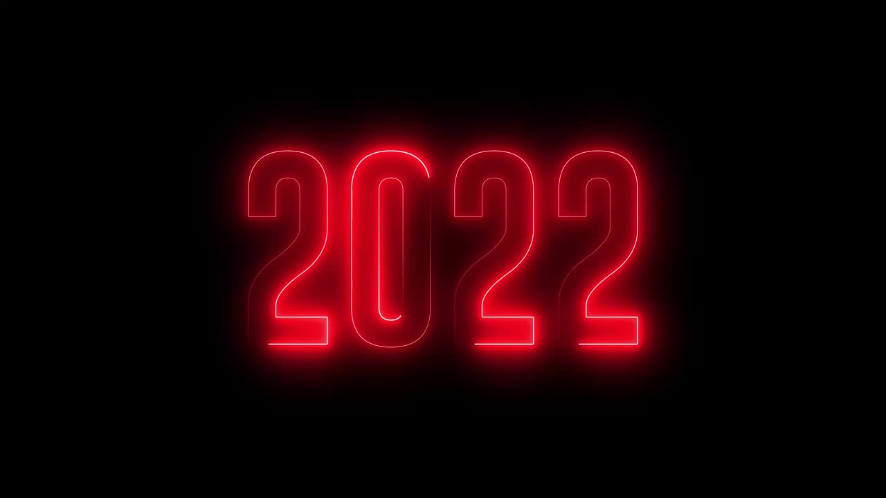 霓虹2022彩色文字“新年快乐2022”。新年有闪闪发光的标志。视频素材