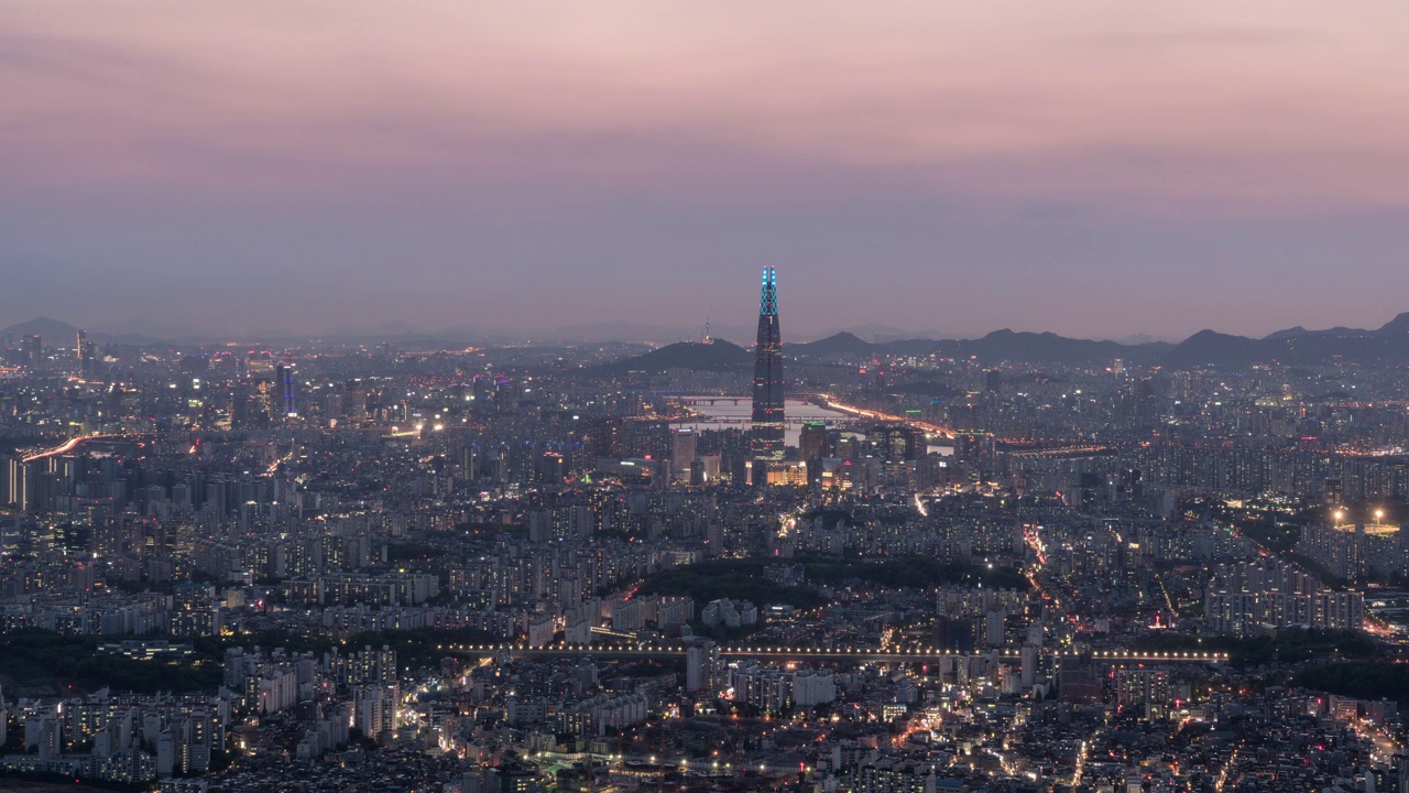 ▽夜景=韩国首尔，汉江、乐天世界大厦、松坡区蚕室等市中心的日落视频素材