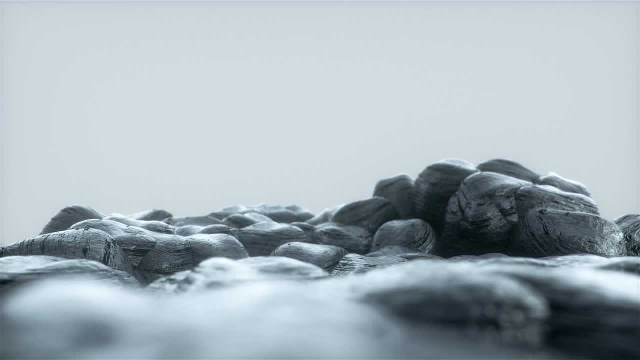 写实的黑色岩石，白色背景上极简风格的岩石视频素材