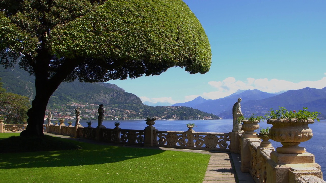 科摩湖全景。美丽的花园和清澈的水，以山为背景。视频素材