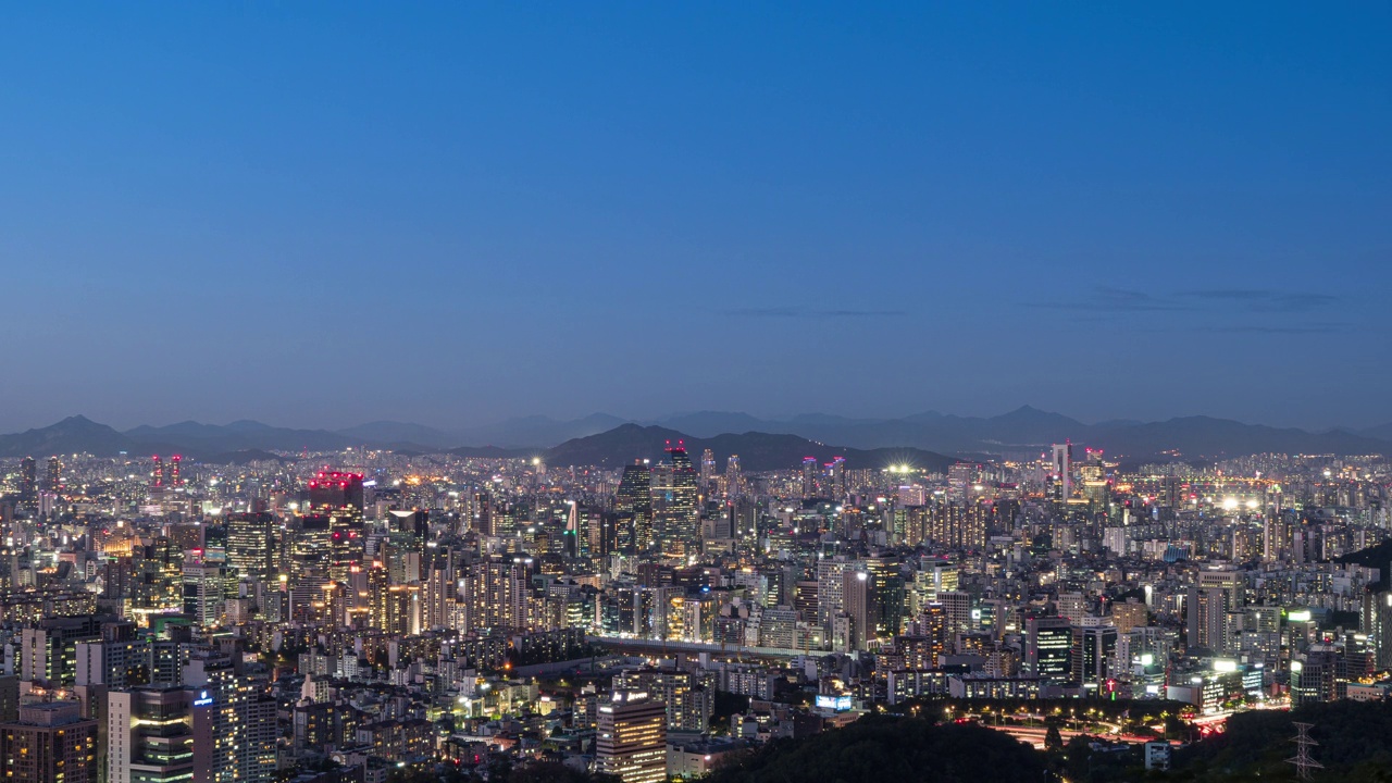 韩国首尔市中心/瑞草区和江南区的日落和夜景视频素材