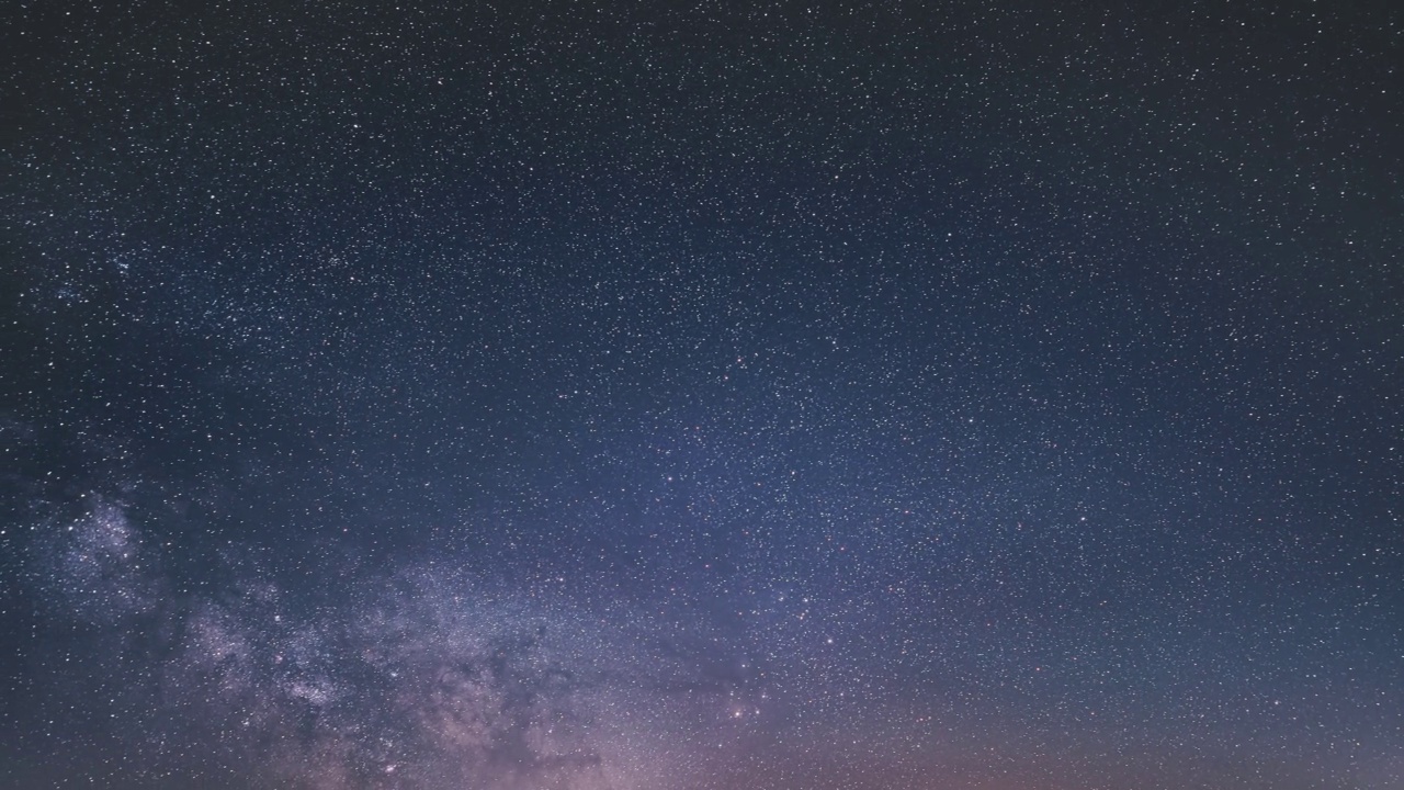 银河星系恒星背景在星空时间流逝的夜晚到白天视频素材