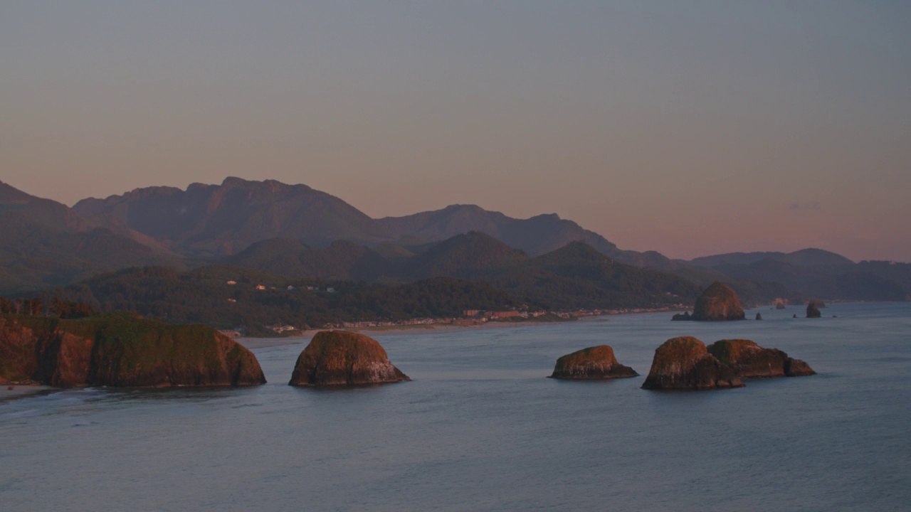 佳能海滩在夕阳下的时间流逝视频素材