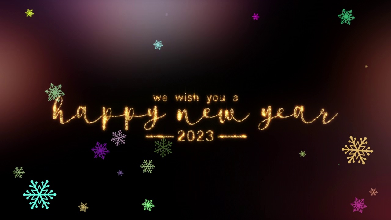 2023年新年金色闪光闪烁文字动画配上光学耀斑爆炸。美丽的电影标题抽象背景视频素材