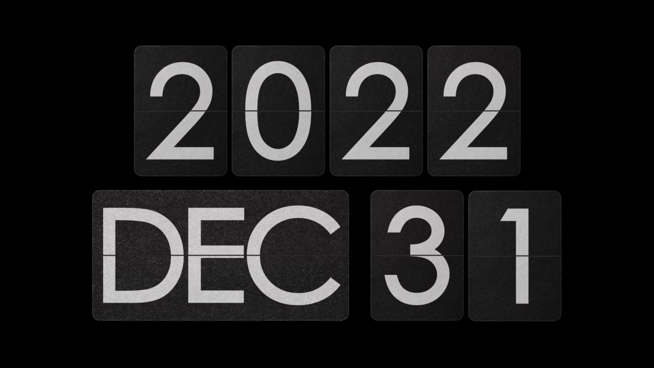 从2022年12月到2023年1月，alpha哑光开关上的机械翻转时钟。复古设备蒸汽朋克翻转日历。新年快乐! !视频素材