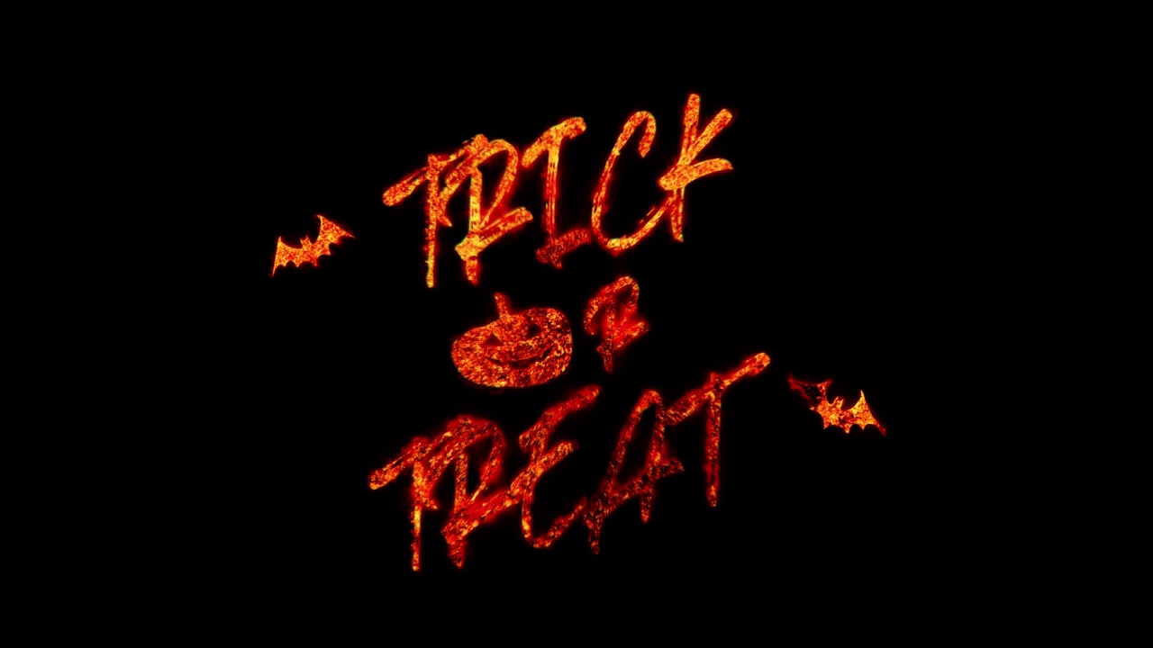 火烧文字的Trick or Treat Word。金红色发光的Trick or Treat循环动画万圣节活动概念。4K 3D渲染与alpha通道Quicktime prores 4444隔离透明。视频素材