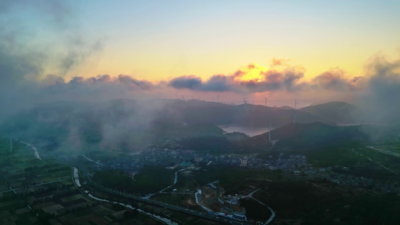 航拍日出云海风力发电视频素材