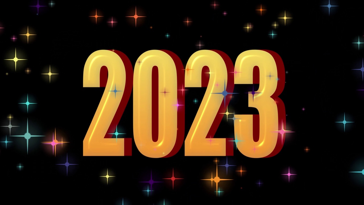 文字2023动画和火花隔离在黑色背景上，2023新年，设计模板快乐2023新年概念假期动画卡视频素材