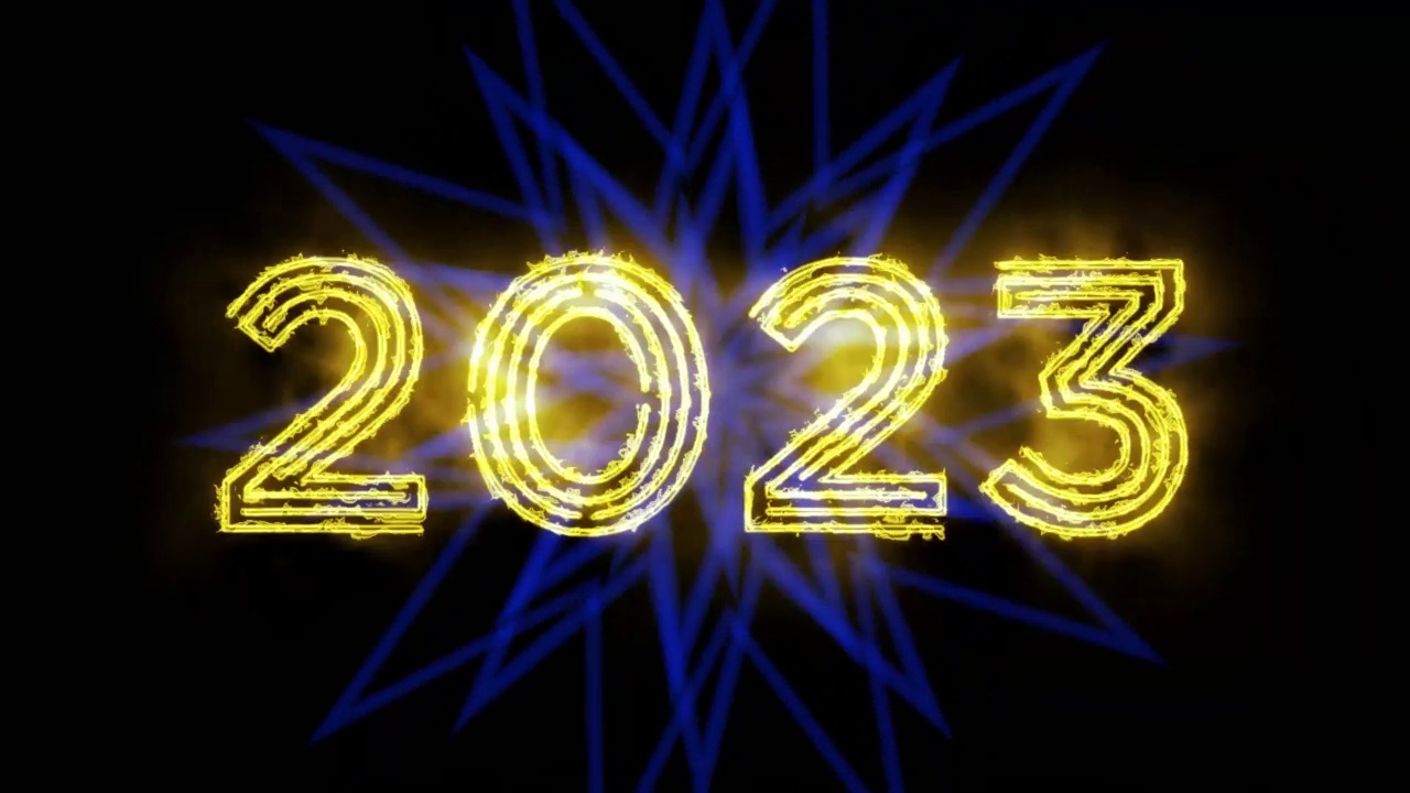 文字2023动画和火花隔离在黑色背景上，2023新年，设计模板快乐2023新年概念假期动画卡视频素材