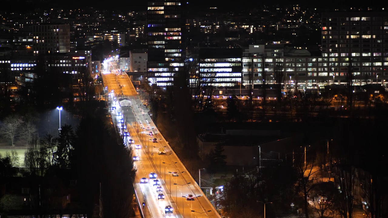 Video time lapse of car traffic at night on Europabrücke bridge in Zurich city, Switzerland. High vantage point视频素材