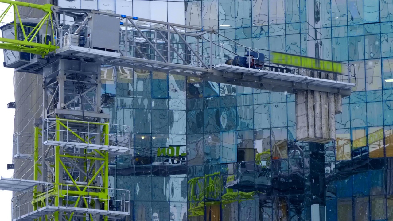 Beautiful skyscrapers with glass façade that reflects the surrounding buildings视频素材