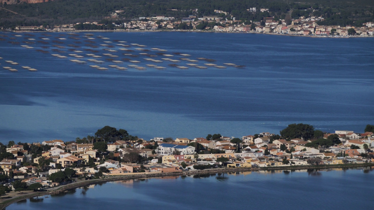 Sète, Hérault department,Occitanie, France. The etang de Thau. In the background is the oyster farming of Bouzigues.视频素材