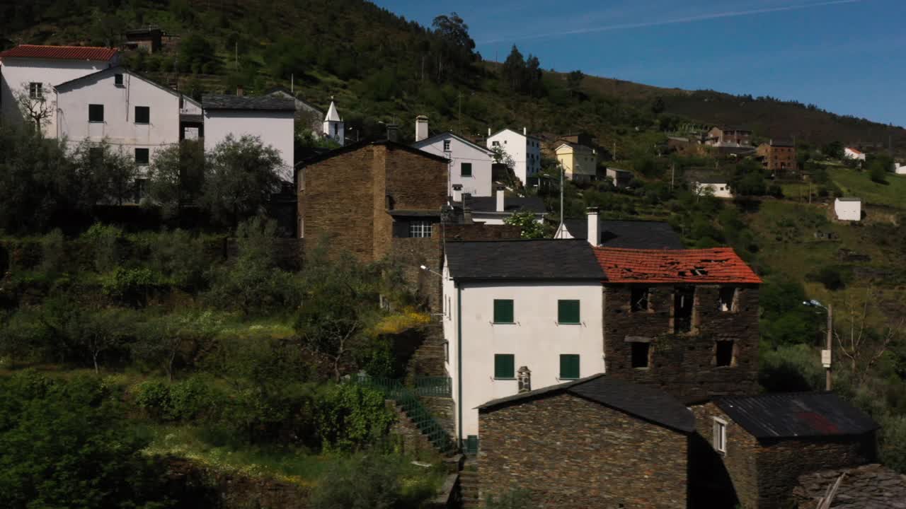 Aerial images of schist houses of small village situated at Serra da Lousã, unique cultural landscape in Central Portugal视频素材