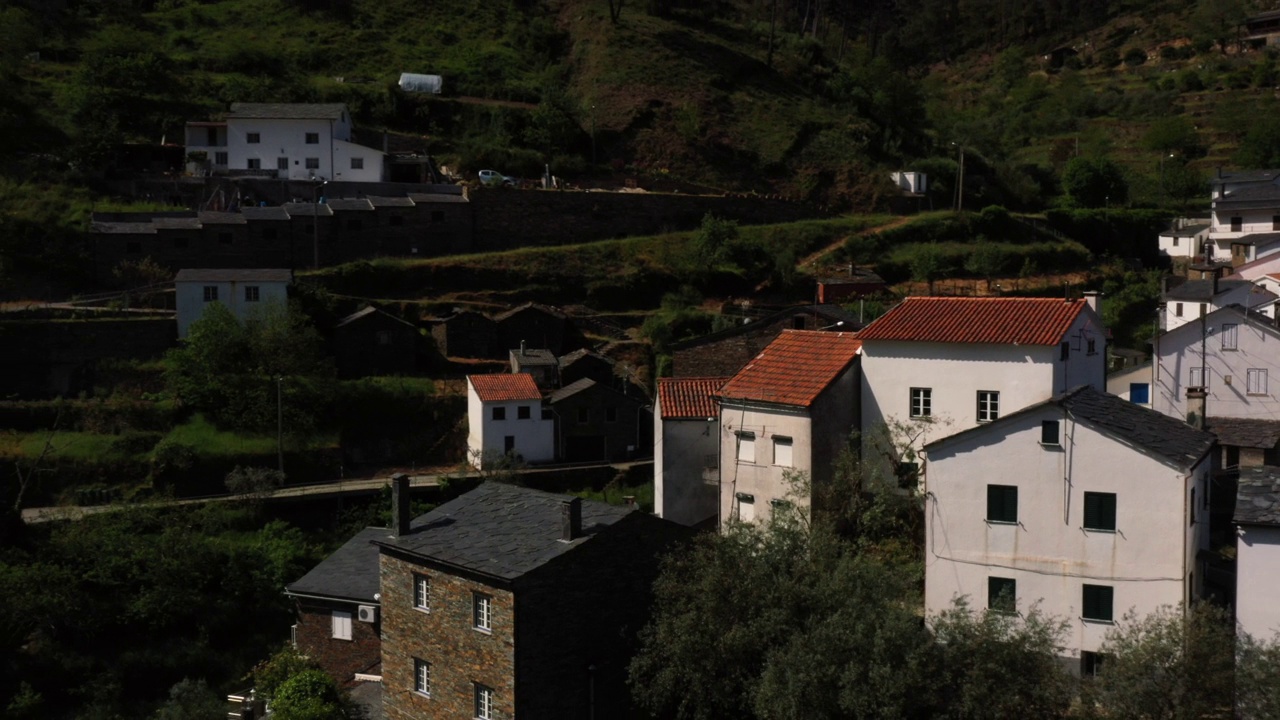 Aerial images of schist houses of small village situated at Serra da Lousã, unique cultural landscape in Central Portugal视频素材