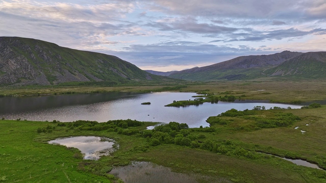 Stave Norway Aerial v7 low level drone flyover popular camping site on green coastal meadow towards beautiful måvatnet lake surrounded by beautiful landscape - Shot with Mavic 3 Cine - June 2022视频素材