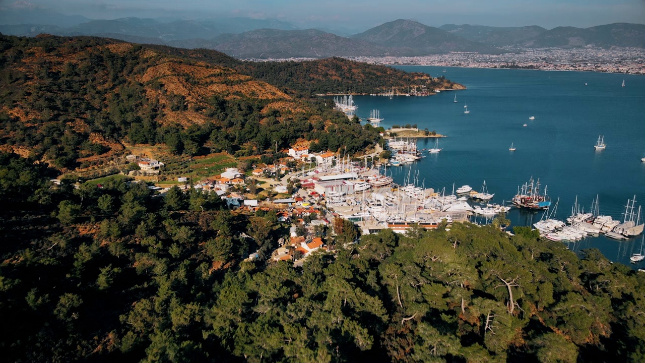 Aerial drone view of marina bay in small city. Fethiye, Türkiye视频素材