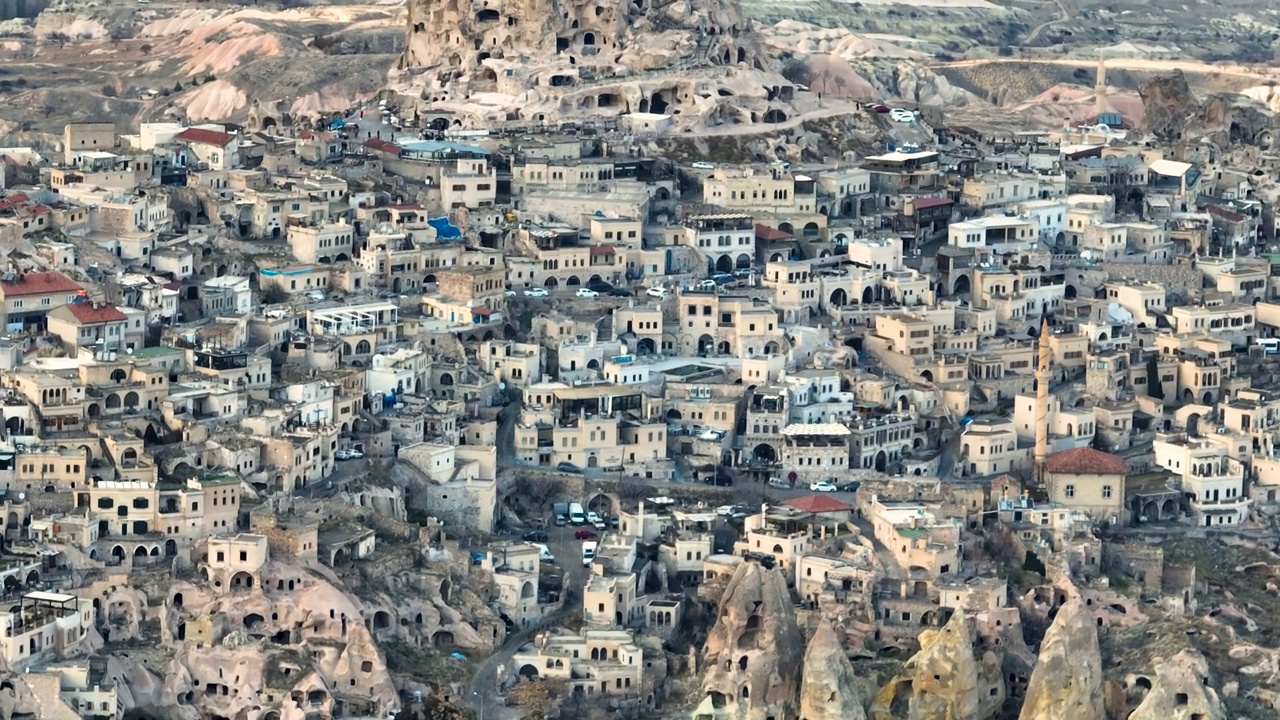 Aerial view of  Uchisar, Aerial view of cappadocia, Uçhisar castle, famous place of turkey, natural formation fairy chimneys, unesco heritage destination, Aerial view of Cappadocia, historical region in Central Anatolia, old settlement, village of stone视频素材