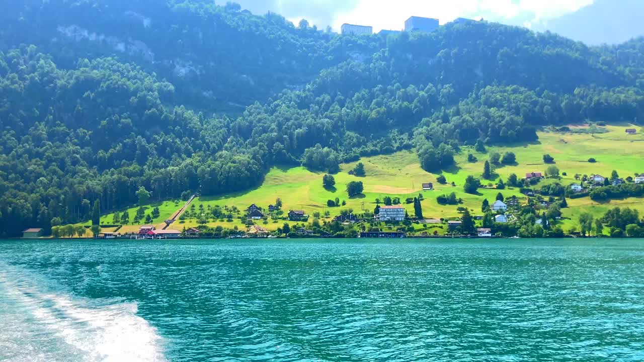 旅行在卢塞恩湖与山景和豪华酒店伯格斯托克山顶在一个阳光明媚的夏日视频素材