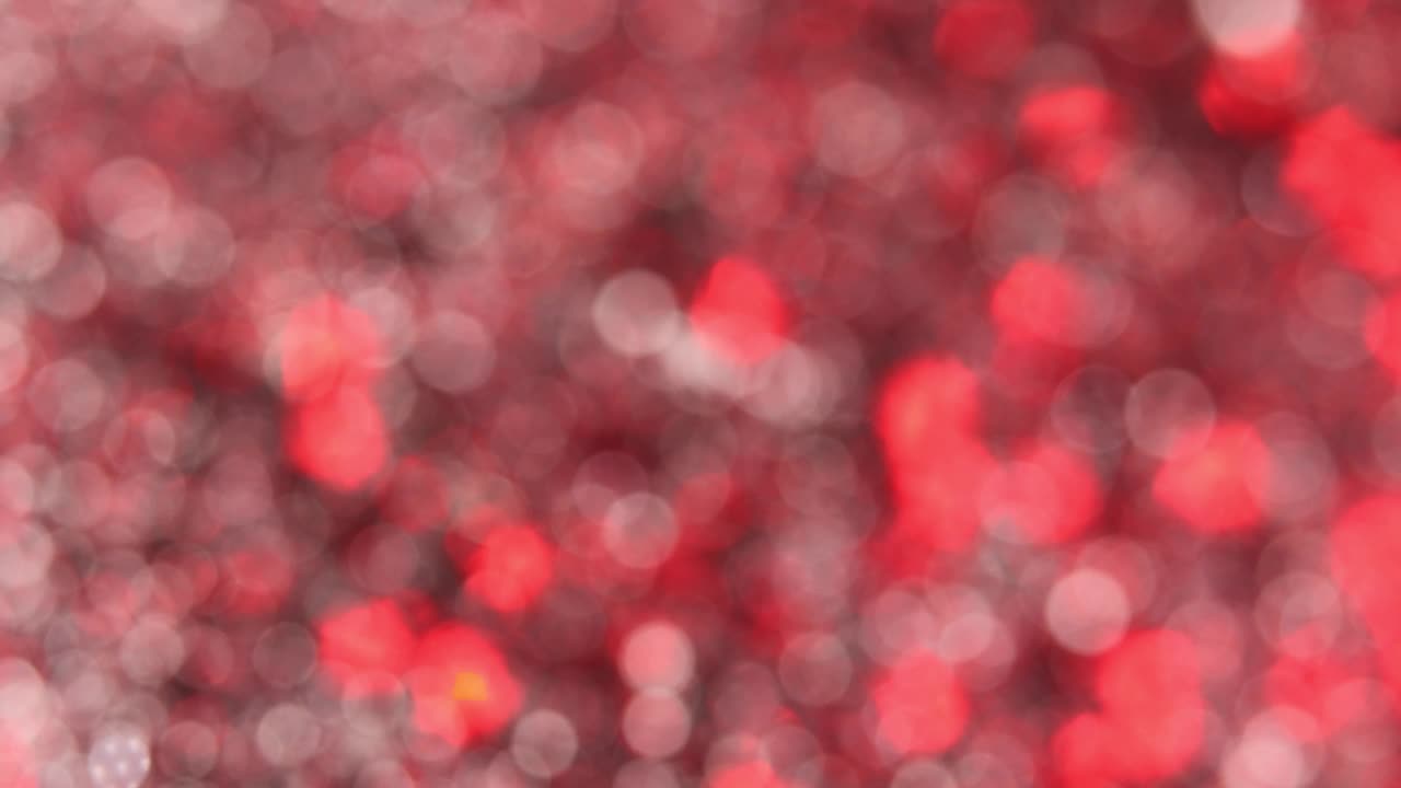 红色移动散景光泽闪光壁纸完美的圣诞节，新年或任何其他节日背景视频下载