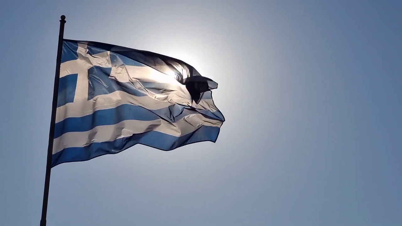 希腊国旗希腊在风和阳光下飘扬视频下载