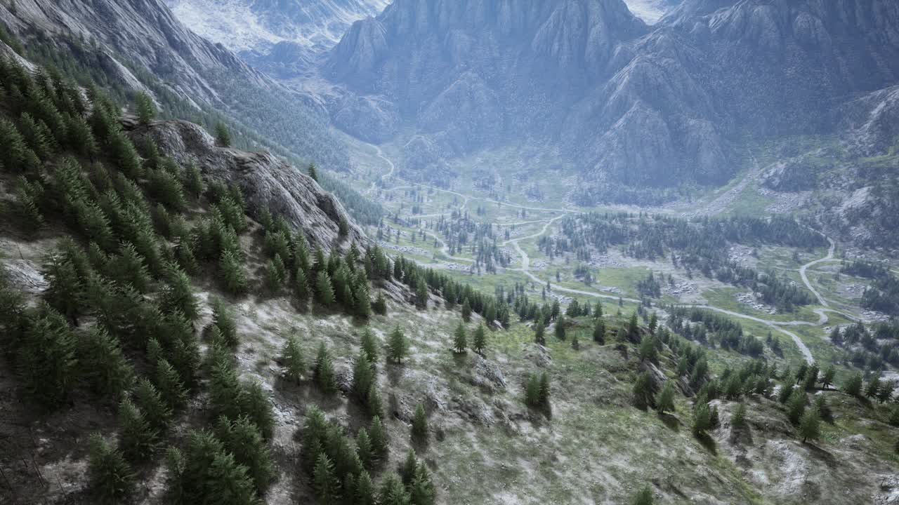 一个风景如画的山谷，从空中俯瞰蜿蜒的道路视频素材