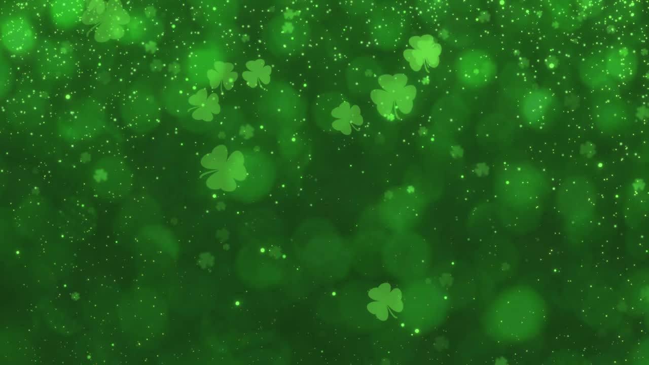 抽象流畅的运动绿色闪亮模糊三叶草三叶草快乐的圣帕特里克节庆祝活动与闪光和灰尘闪烁背景无缝循环动画视频下载