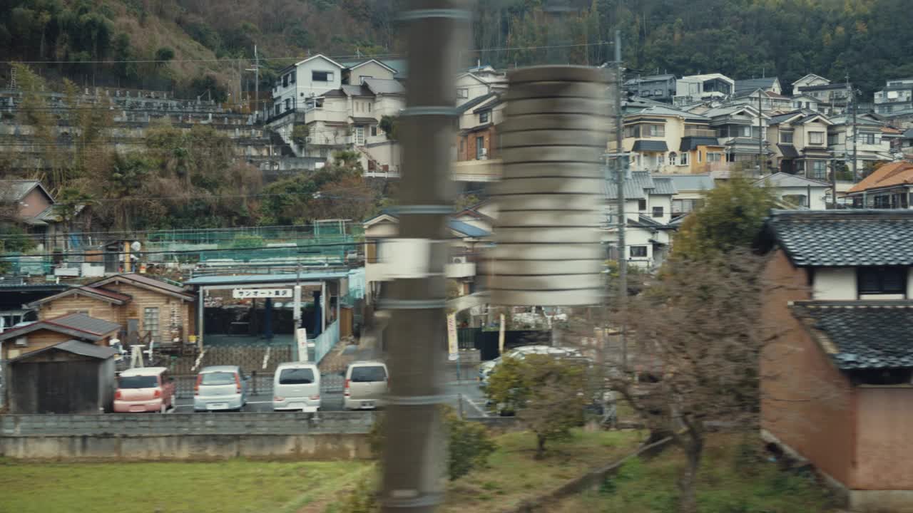 日本大阪高速列车窗外的景色视频素材