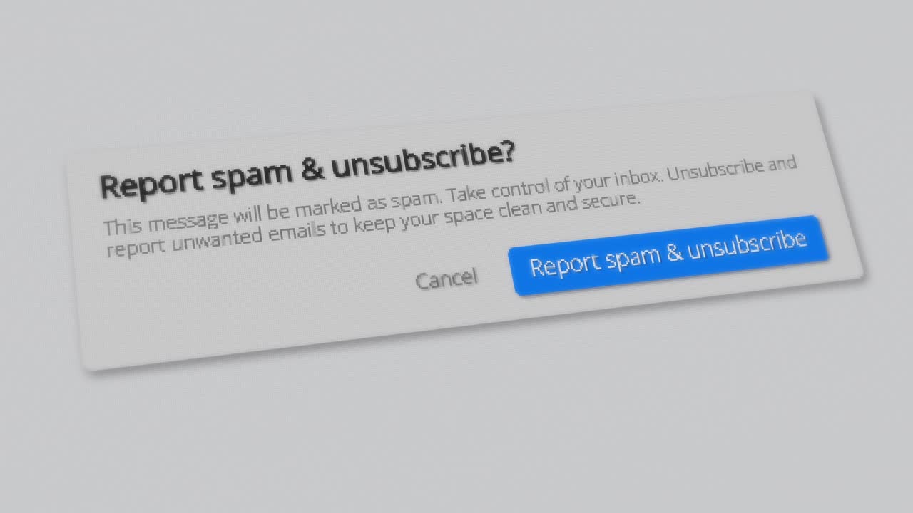 鼠标指针单击设备屏幕上的报告垃圾邮件和取消订阅按钮。保持邮箱整洁的概念，以防止黑客攻击。视频下载