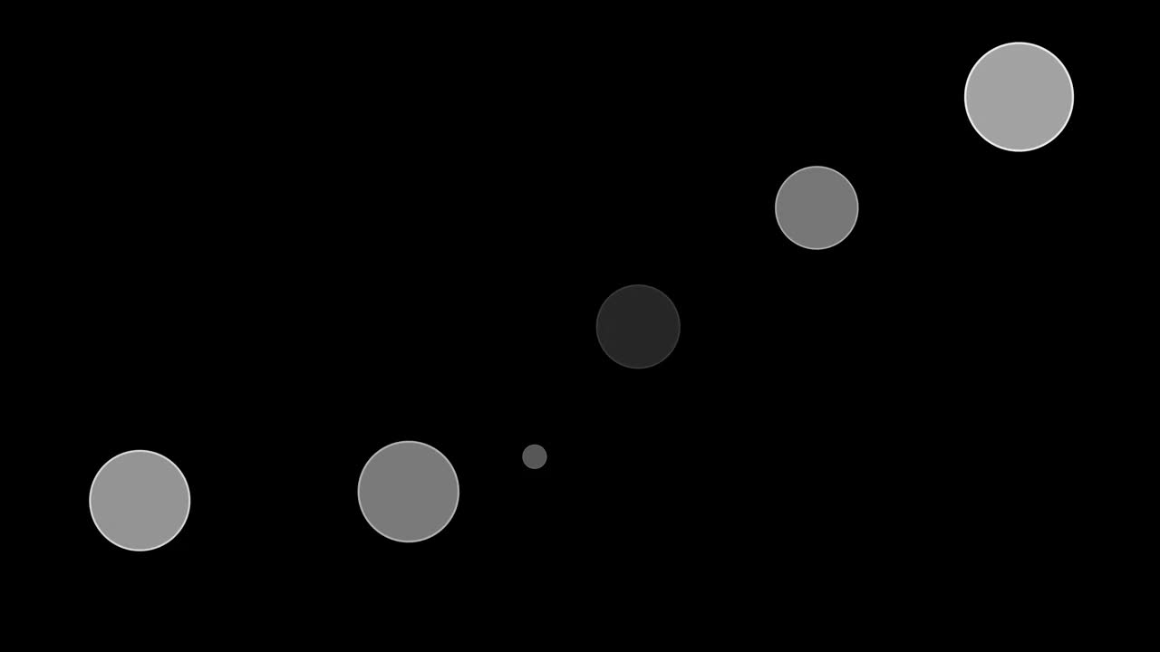 循环抽象白色圆散景在黑色背景视频下载